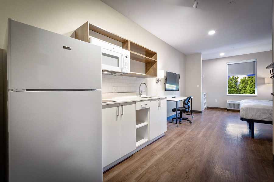 Spacious suite with full kitchen and workspace