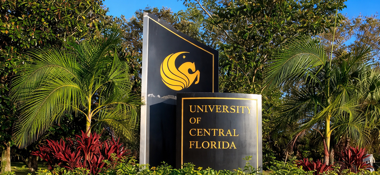 Entrance to the UCF Arboretum with University of Central Florida plaque.