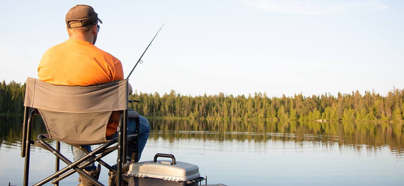 Man fishing on the lake.