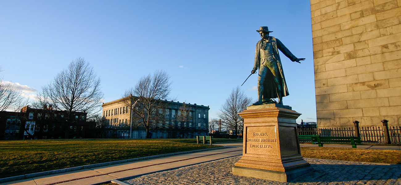 Statue of Col. William Prescott in front of the Bunker Hill Monument.